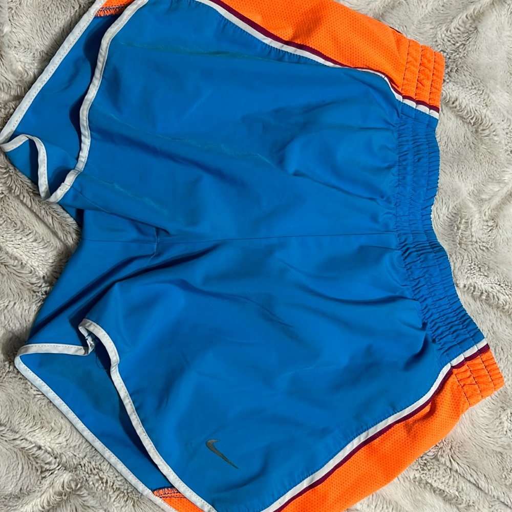 Orange and blue Nike shorts